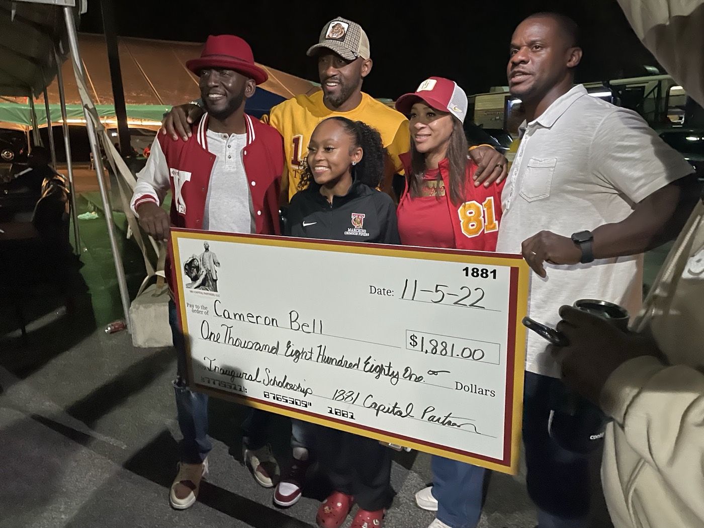 Partners of 1881 Capital Partners presenting the inaugural scholarship check to Cameron Bell