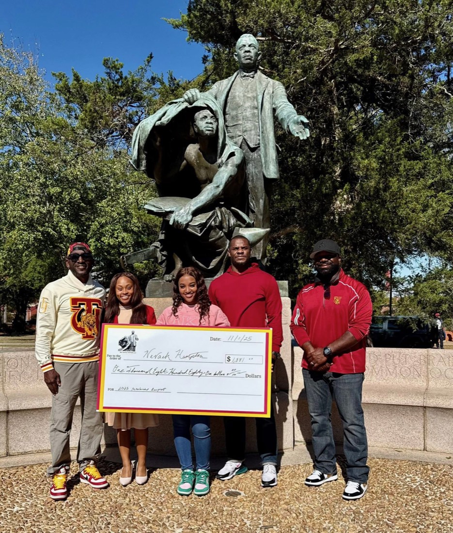 The 2025 scholarship presentation to Nevaeh Hampton at the Booker T. Washington monument at Tuskegee University